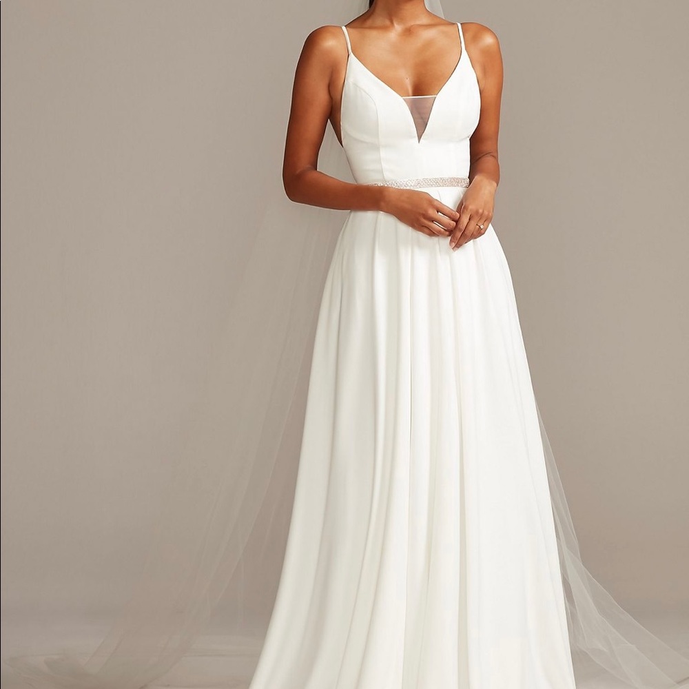 Brand new, beautiful, simple wedding dress.